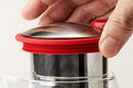 Red extra fine stainless steel tea infuser, designed for the 430ml Forlife Bell Glass Teapot